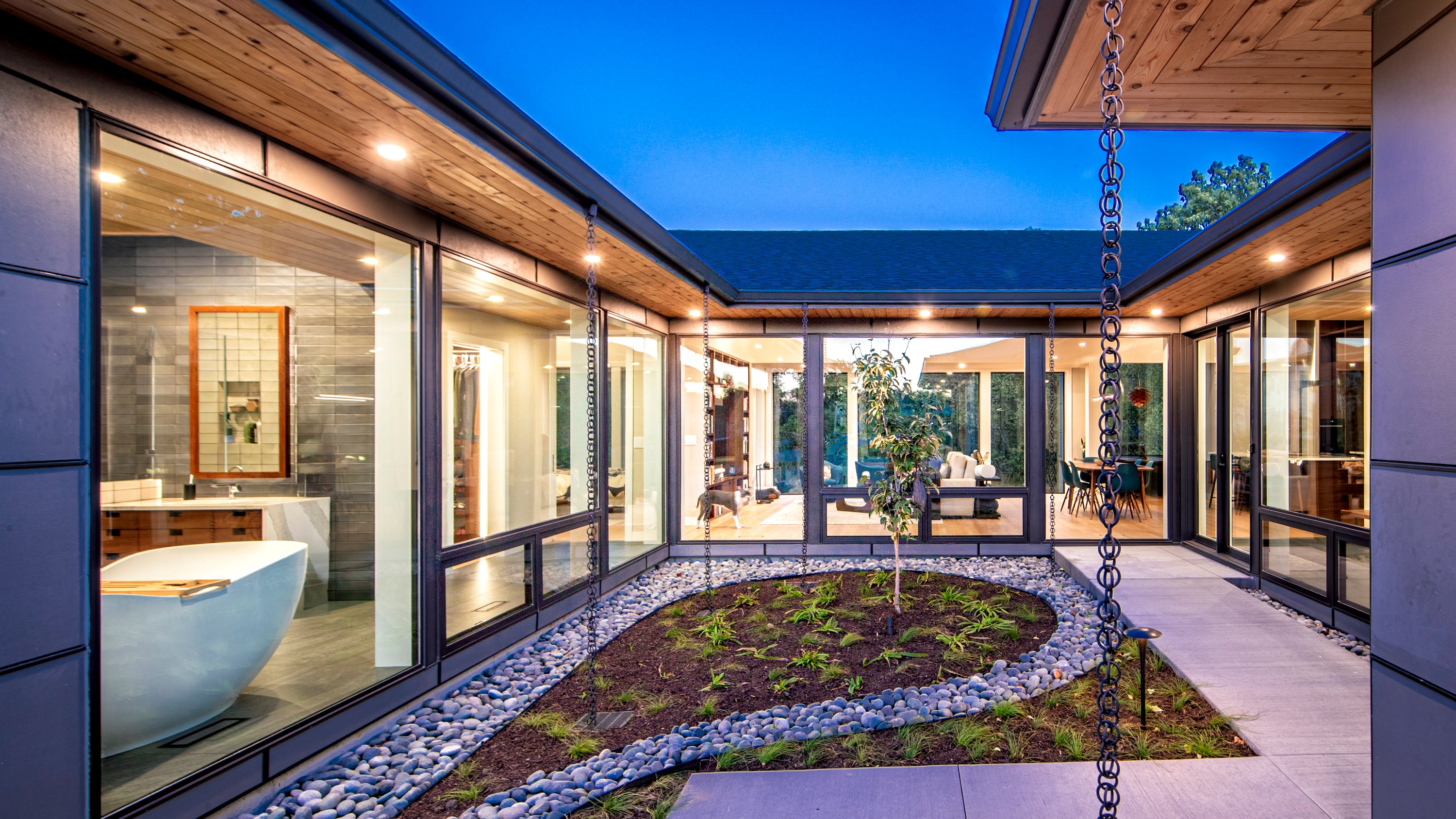 Modern house with a courtyard garden area and large windows