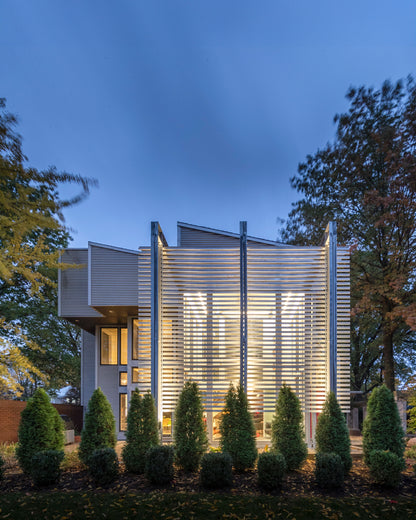 Modern Sunroom addition with exposed structural framing. Akar Architecture.